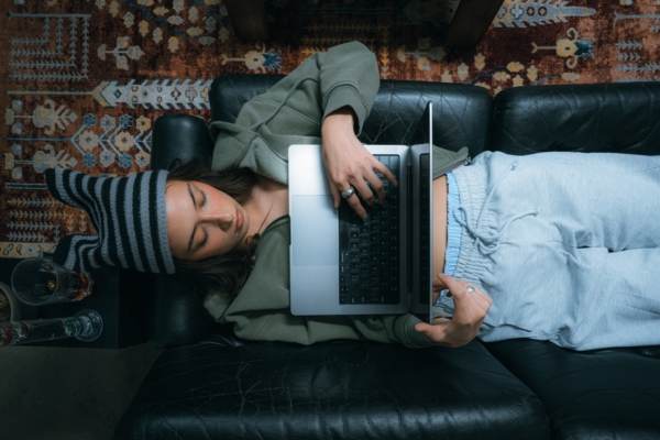Why Modern Cannabis Culture Looks Nothing Like 2016 5 Image Of Woman Laying With Laptop On Couch